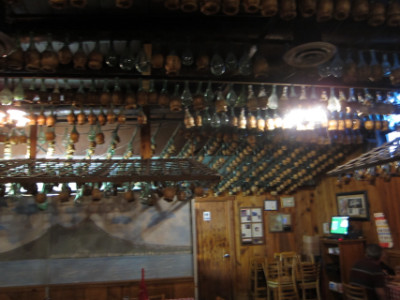 Wine bottles on the ceiling