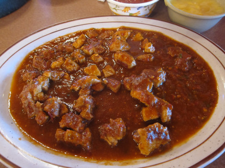 Guisado with red sauce