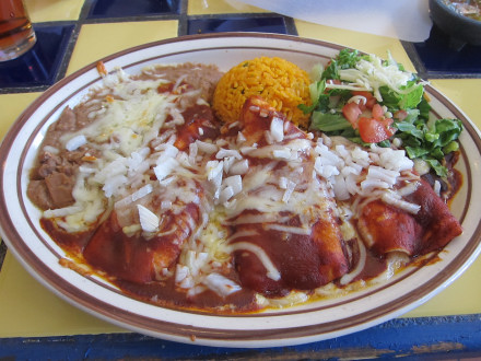 Red enchiladas with onions