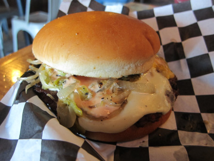 Green chile cheeseburger from Chase the Taste